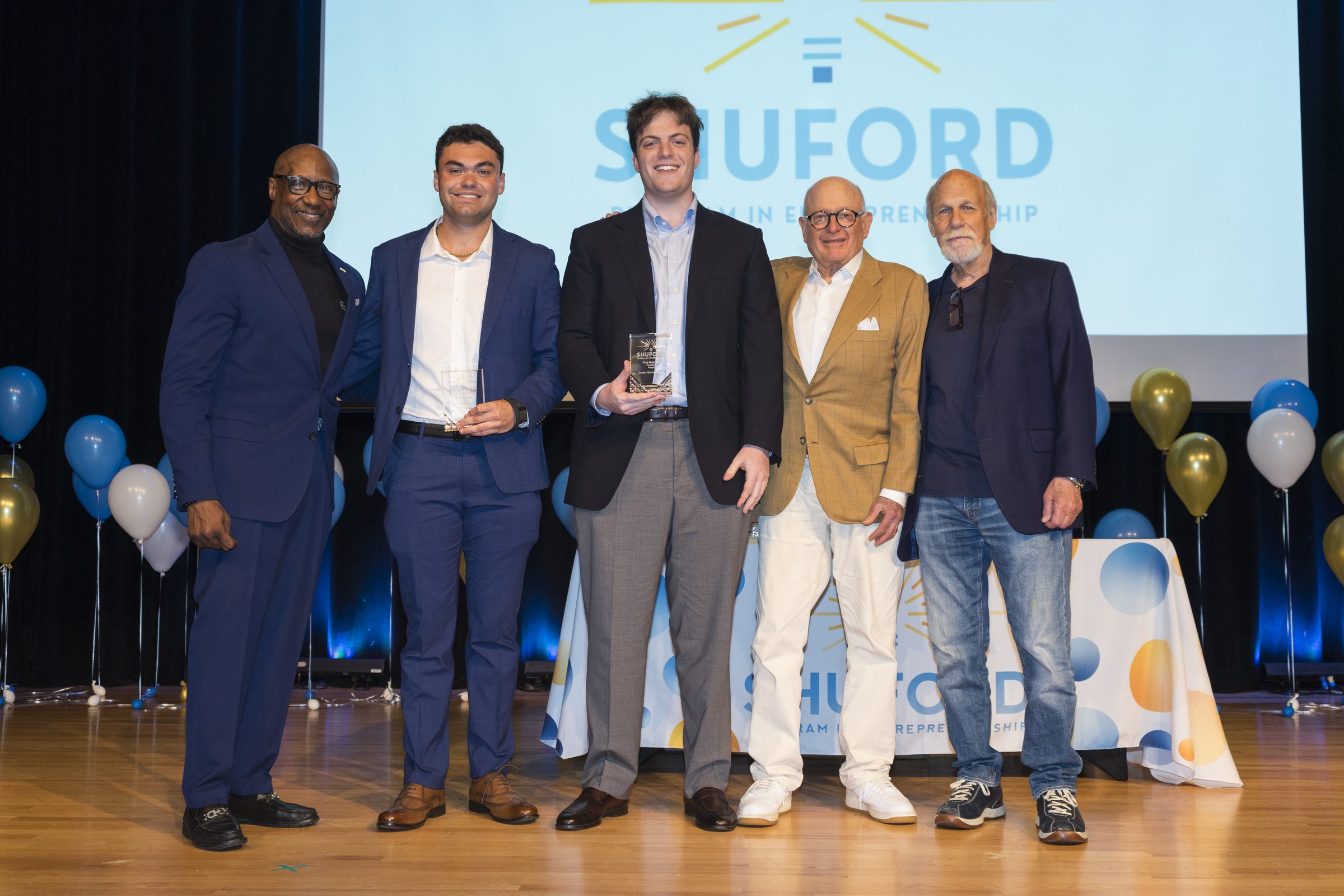 Justin Sonnenreich receiving the Buck Goldstein Founder Award at the Shuford Program in Entrepreneurship, UNC Chapel Hill